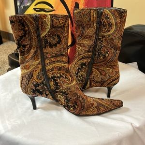 Paisley print velvety heeled mid calf boot. Pointy toe boots
